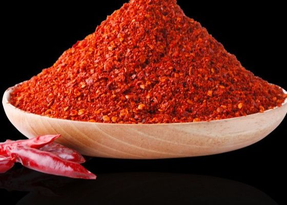 Υψηλές SHU ξηρές κόκκινες τσίλι νιφάδες κόκκινων πιπεριών νιφάδων πικάντικες για την πίτσα